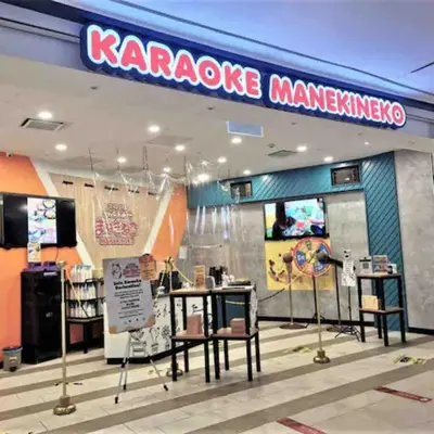 a karacco manneken store with tables and chairs at 2Room 8pax Link to Velocity Mall MRT KL in Kuala Lumpur
