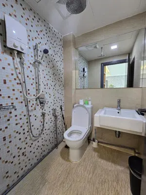 a bathroom with a shower and a toilet and a sink at KLCC SOGO new 2R2B LRT PWTC Sunway Putra Sky Pool in Kuala Lumpur