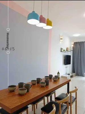 a dining room with a wooden table with bowls on it at Big Group 3R2B Sunway Velocity KL Walking distance to Monorail in Kuala Lumpur