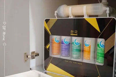 a vending machine with four bottles of toothpaste at Luxury Homestay KL Center 6-8pax TRX-Velocity-Ikea in Kuala Lumpur