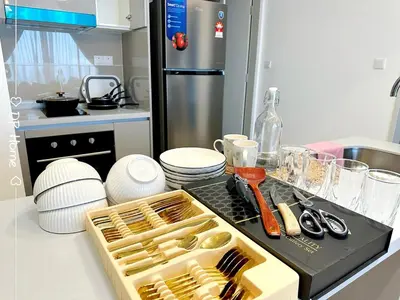 a kitchen with a counter with utensils on it at Luxury Homestay KL Center 6-8pax TRX-Velocity-Ikea in Kuala Lumpur