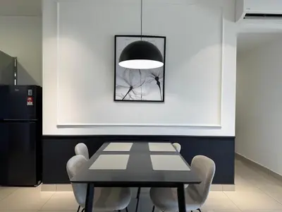 a dining room with a black table and white chairs at M Vertica E33A10 l 4 Bedroom l 8 Pax in Kuala Lumpur