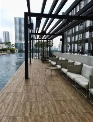 a row of couches on the side of a building at Vivo Suite 4 pax 2 bed Studio in Kuala Lumpur
