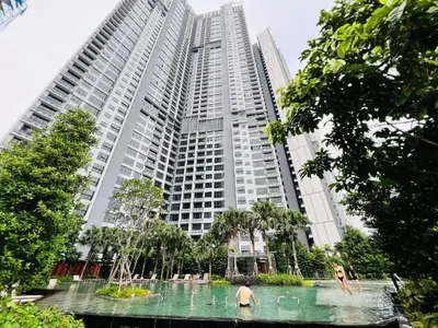 a large building with people in the water in front of it at Agile Residence Service Suites Bukit Bintang KL in Kuala Lumpur