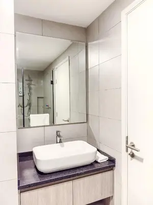 a bathroom with a sink and a mirror at The Atrium at Jalan Ampang by OKBnB - Classy Vibes 2Bedroom Apartment nearby KLCC , Pavilion & TRX in Kuala Lumpur