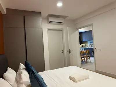 a bedroom with a bed with a towel on it at The Atrium at Jalan Ampang by OKBnB - Classy Vibes 2Bedroom Apartment nearby KLCC , Pavilion & TRX in Kuala Lumpur