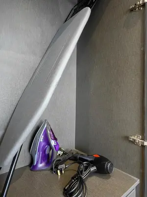 a counter with a knife and a pair of scissors at TRX Agile Bukit Bintang Boutique 2 Bedroom and 1 Living Room Suites in Kuala Lumpur