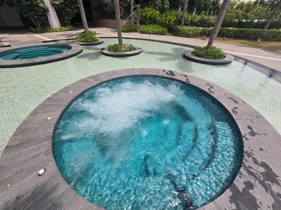 a large swimming pool with blue water in the middle at Trion Kuala Lumpur For KLCC view BLOCK C in Kuala Lumpur