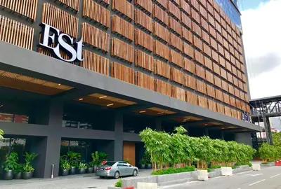 a car parked in front of a building at The Establishment Bangsar #29 by Ouki in Kuala Lumpur