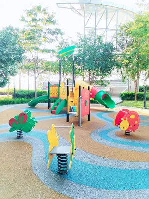 a park with a playground with slides at TRION Luxury City Suites Near KLCC & TRX in Kuala Lumpur