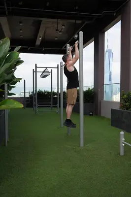 a man is doing a trick on a pole at Rivera City, KL Sentral Studio Apartment in Kuala Lumpur