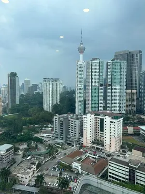 a city skyline with tall buildings in a city at Robertson Suites At Bukit Bintang Kuala Lumpur in Kuala Lumpur