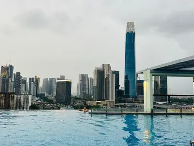 a view of a city from a river with a city at D'Majestic Place by Roomy in Kuala Lumpur