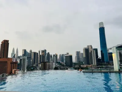 a view of a city from a river with buildings at D'Majestic Place by Roomy in Kuala Lumpur