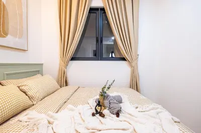 a bedroom with a bed with a cactus on it at Kids Friendly Homestay at Riana Dutamas in Kuala Lumpur