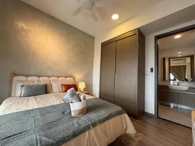a bedroom with a large bed and a bathroom at Agile Bukit Bintang TRX KL by Lilbean Space - 2B1R in Kuala Lumpur