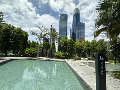 a swimming pool with a city skyline in the background at Agile Bukit Bintang TRX KL by Lilbean Space - 2B1R in Kuala Lumpur