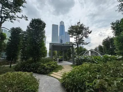a park with stairs in a city with tall buildings at Agile Bukit Bintang TRX KL by Lilbean Space - 2B1R in Kuala Lumpur