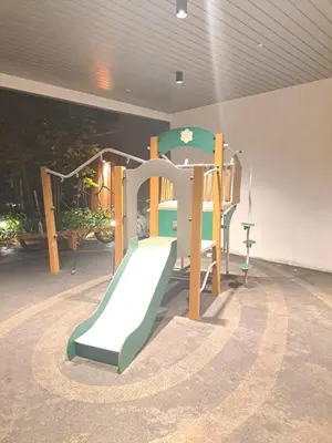 a playground with a slide in a room at Agile marigold Suite KL in Kuala Lumpur