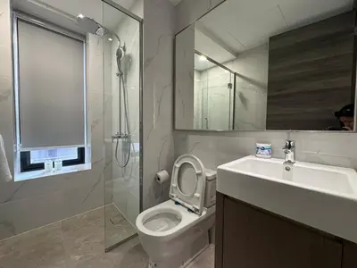 a bathroom with a toilet and a sink and a shower at Agile Bukit Bintang TRX KL by Lilbean Space - 2B1R in Kuala Lumpur