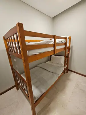 a couple of bunk beds in a room at Sky suites KLCC Level 58, 600Mbps WiFi - 2R plus 1BB in Kuala Lumpur