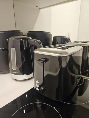 a counter with two toasters and a toaster at Sky suites KLCC Level 58, 600Mbps WiFi - 2R plus 1BB in Kuala Lumpur