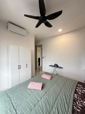 a bedroom with a bed with a ceiling fan at Cozy 2BR 2BR 2-5 Pax Kenwingston KL Genting View & Parking & Netflix 4505 in Kuala Lumpur