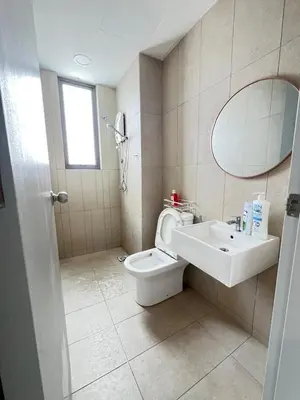 a bathroom with a toilet and a sink and a mirror at Cozy 2BR 2BR 2-5 Pax Kenwingston KL Genting View & Parking & Netflix 4505 in Kuala Lumpur
