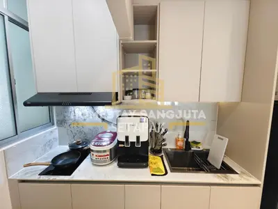 a kitchen with a counter top with a sink at Homestay SANGJUTA Setapak - Kid Friendly in Kuala Lumpur