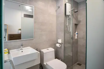 a bathroom with a toilet and a sink and a shower at Cozy Studio l Riveria City l 1km to KL Sentral in Kuala Lumpur