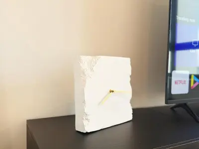 a roll of paper on a desk next to a computer monitor at Cozy Unit l Agile BB l 5min walk to TRX Pavilion in Kuala Lumpur