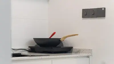 a mortar and pestle sitting on top of a kitchen counter at Homey 2BR l Neu Suites l 5min to KL City in Kuala Lumpur