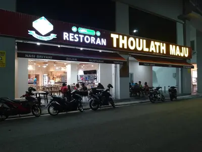 a row of motorcycles parked in front of a restaurant at Razak City Kuala Lumpur D4 09 in Kuala Lumpur