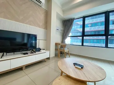 a living room with a large television and a table at Arte Plus Ampang By Couple Stay in Batu Empat
