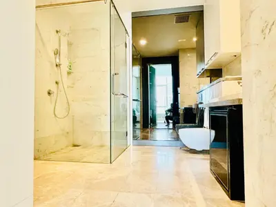 a bathroom with a shower and a bath tub at Platinum Suites KLCC By Premium Hospitality in Kuala Lumpur