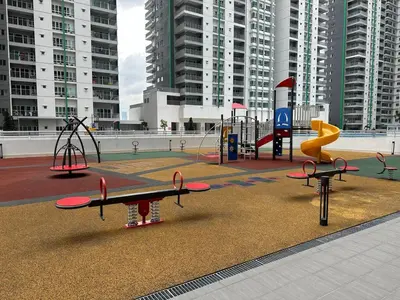 a play area with a playground with a surfboard and swings at Anaqi Homestay by Razak City Sg Besi in Kuala Lumpur