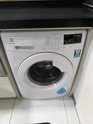a white washing machine with a black counter top at 08-3 Sweet Home-Casa Residency 3R 2B City View in Kuala Lumpur