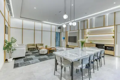 a dining room with a table and chairs at Agile Residence Bukit Bintang, TRX by Isabella in Kuala Lumpur
