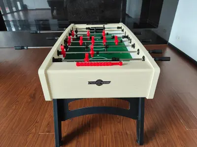 a foosball table with red balls on it at Lovely Studio room in KL in Kuala Lumpur