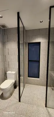a bathroom with a toilet and a window at Scarletz Suite By Skyscraper in Kuala Lumpur