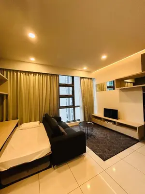 a living room with a bed and a television at Robertson Special Suites By Luna in Kuala Lumpur