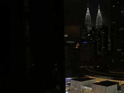 a view of a city skyline at night at Fahrenheit88 Opposite Pavilion KL Bukit Bintang in Kuala Lumpur