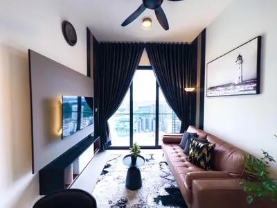 a living room with a couch and a large window at Premier Stay KL - Bangsar South - King Bed - Work Space - Near LRT, VE, Conexxion in Kuala Lumpur
