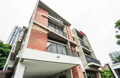 a brick building with balconies on the side of it at 68 Palms 04 l Midvalley l 6 Pax in Kuala Lumpur