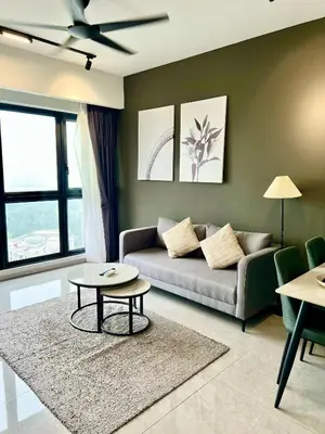 a living room with a couch and a table at Agile Bukit Bintang By Well Shaped in Kuala Lumpur