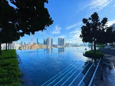 a large body of water with a city in the background at M Vertica Cheras KL City Fully Air-Con Nice View Home in Kuala Lumpur