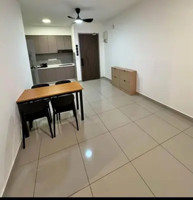 a kitchen and dining room with a table and chairs at Cozy Room in Kuala Lumpur