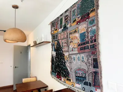 a wall mural of a city with a christmas tree at Cozy Studio l Riveria City l 1km to KL Sentral in Kuala Lumpur