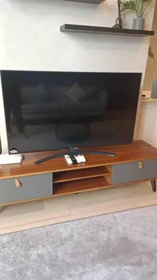 a flat screen tv sitting on top of a table at Star Residence Klcc By Stellar Inn in Kuala Lumpur