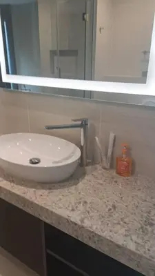 a bathroom counter with a sink and a mirror at Star Residence Klcc By Stellar Inn in Kuala Lumpur